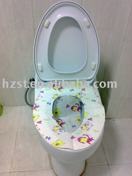 Disposable_paper_toilet_seat_covers.jpg