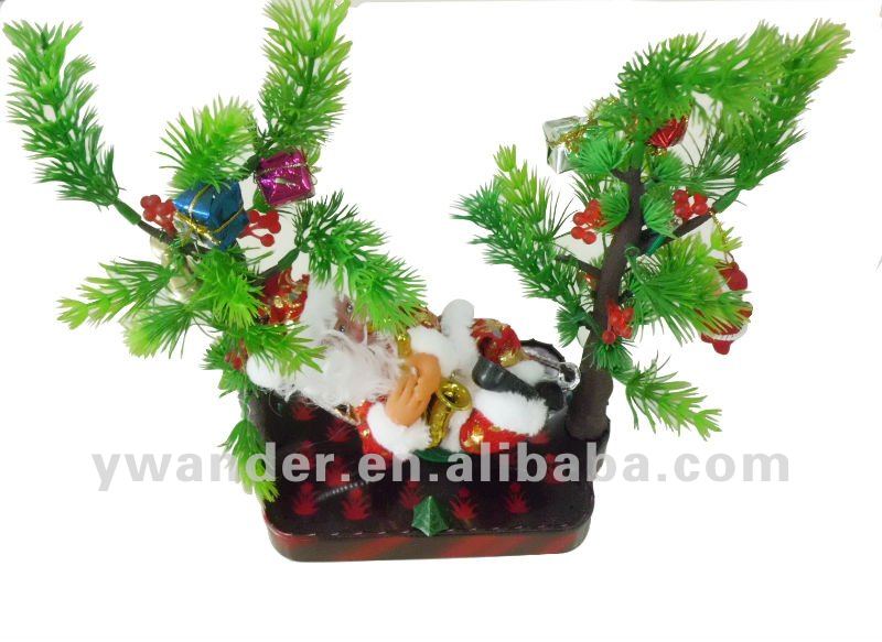 1 DICEMBRE Shining_lights_christmas_tree_bell_and_santa_claus_gift