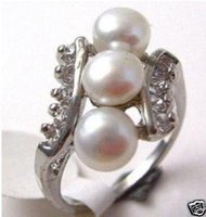 Maravilloso exquisita joyería de plata 3 White Pearl Ring (China (continental))