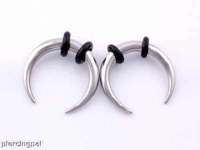 expanders for ears. Steel expander with these fake