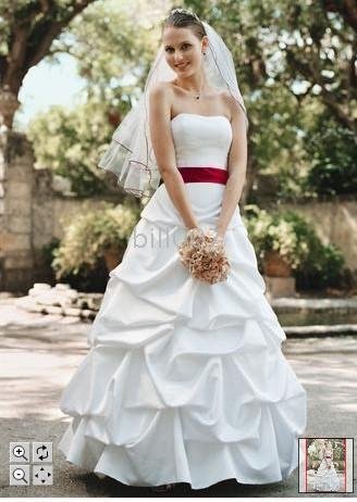 the wedding dress a similar sash or ribbon in a complimentary color can